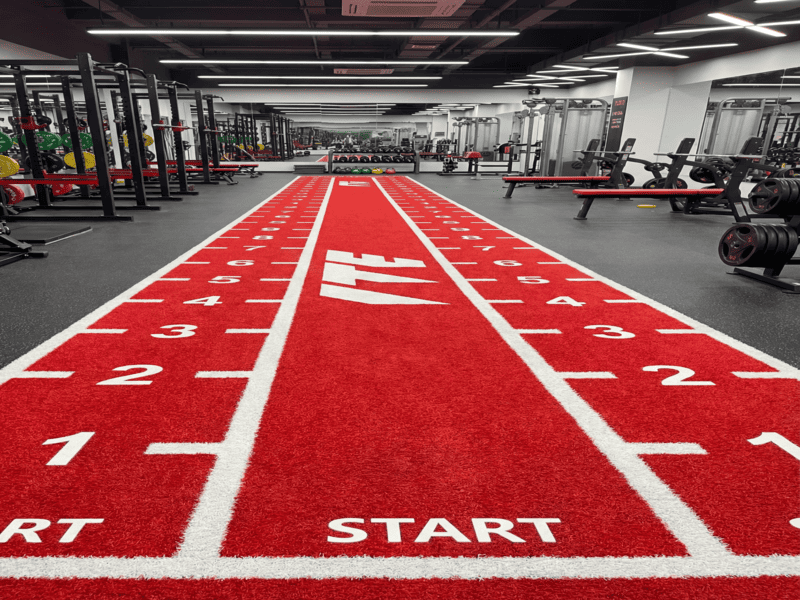 Technician prepping curled turf edge